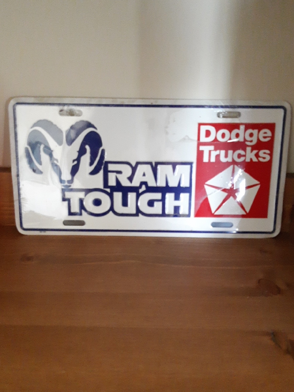Dodge Trucks RAM Tough Metal License Plate Sign - White/Blue/Red